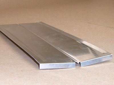 B-138 stamped metal roof tab