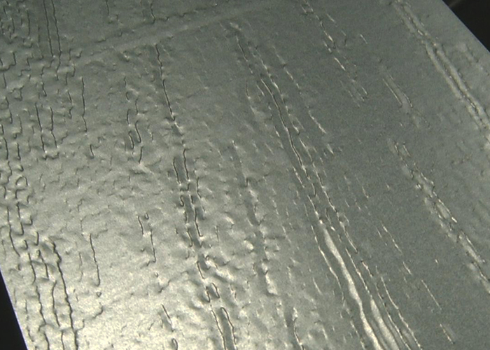 Wood grain embossed and painted sheet - MP Metals