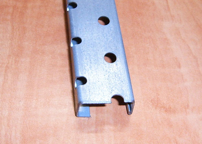 Holes along a part - MP Metals