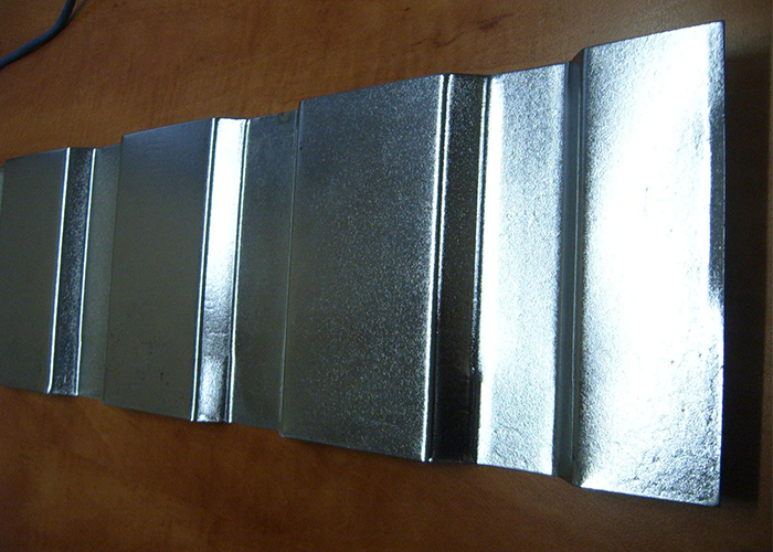 Add ribs to stiffen flat areas - MP Metals