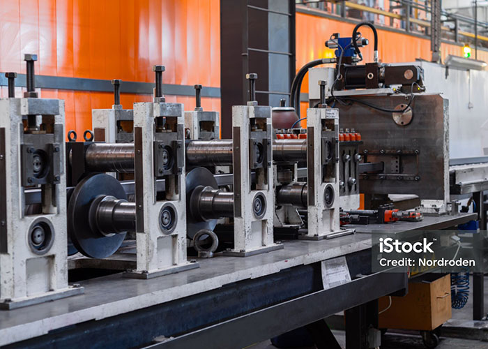 Four roll-forming stations at the end of a roll-forming machine - MP Metals