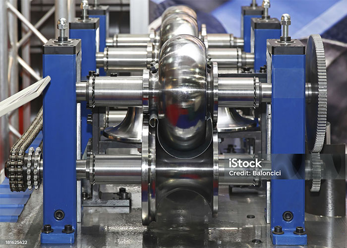 Roll-forming stations with tools for bending a round tube profile - MP Metals