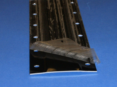 H-125 - Pre-painted Black Aluminum Hat Channel Strippable Film